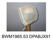 Baby's cap or undercap, fine cotton, topstitched 6.5cm diameter crown, edges have 5mm casing for drawstring and Valenciennes lace frill, narrow ribbon ties, stiff, organdie-like fabric, casings formed by turnings, casing encloses ribbon, but no loose en