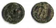 Coin, Roman, bronze, excavated at Lankhills School, Winchester, Hampshire, issued by Valentinian I, 364 to 375.