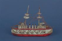 Model ship, papier mache ship with wooden masts and string rigging, hull and deck painted red with black and gold detail, with 3 funnels, early 20th century?
