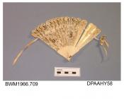 Fan, ivory sticks and leaf printed gold fronds with darker gold flower motifs, damaged, approximate length 130mm, first half of nineteenth century