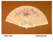 Fan, cream silk leaf handpainted wild roses and blue grey foliage, signed C de Borque, finely fretted ivory sticks with design of butterfly on a flower, guards carved with foliage, approximate radius 295mm, with original box with retailer's label in lid