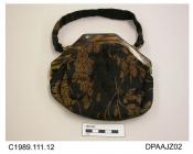 Bag, imitation tortoiseshell frame with clip closure, now detached, black silk brocaded in gold, matching fabric handle, lined corded black silk, trimmed around internal edge with metallic braid, corroded, approximate width 165mm, approximate depth 150m