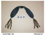 Purse, netted blue silk with gilt beads, ends trimmed long tassels of pinchbeck beads, two small embossed pinchbeck rings, approximate length excluding tassels 270mm, c1830-1860