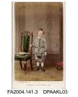 Hand-tinted photograph, Sir Henry Tichborne as a child aged 4 or 5 years, standing by a chair, taken by P Skeolan of Cheltenhamvol 1, page 3