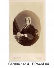 Photograph, oval, The Honourable Dowager Lady Arundell seated at a writing table, taken by Jabez Hughes of Ryde, Isle of Wightvol 1, page 3