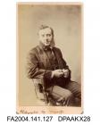 Photograph, Mr W E Cox, Chief Clerk, seated, self-portraitvol 1, page 18 - The Clerks