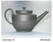 Teapot, black basalt stoneware, flat-shouldered shape with engine-turned vertical ribbing to body and radiating ribs on lid, straight spout, acanthus leaf on handle, not marked, probably Staffordshire, c1800