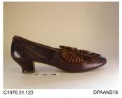 Shoes, pair, women's, bronzed kid, knock-on heel, rounded toe, edges bound brown silk ribbon, large brown satin ribbon Fenelon bow trim to vamp, leather sole size 3, sole stamped with manufacturer's details now mostly worn away apart from A Paris, Fonde