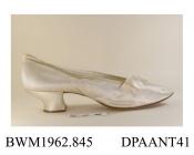 Shoes, pair, women's, wedding shoes, ivory satin, pointed toe, trimmed with flat silk ribbon bow and pearlised bead rosette, lined white kid, yellow satin insole, waisted knock-on heel, leather sole stamped 4 and 7, approximate length overall 270mm, app