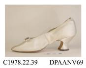 Shoes, pair, women's, court shoe, cream satin, edges bound cream silk ribbon, lined white kid, pointed toe, small satin bow and cut paste trim, straight side seams, no rear seam, curved and waisted Louis heel with kidney shaped top piece, labelled C Moy