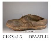 Shoe, one only, brown leather, latchet tied with two pairs of holes over vamp tab, dog leg side seams, rounded toe, thick leather sole with visible stitching, low leather heel, straight leather sole with metal studs, now rusted, approximate length overa