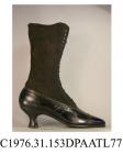 Boots, pair, women's, black suede leg and black glace kid galosh, front laced to mid calf with twenty two pairs of eyelets plus wide black laces over full length tongue, curved top, pointed toe with toecap and decorative punching over the seam, straight