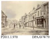 Photograph, black and white, showing The Royal Oak, innkeeper, and the shop fronts of C T Knight and Daysh, High Street, Alton, Hampshire, 1855 - 1870
