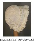 Bonnet, cap, infant's, coif style, fine white linen, headpiece has three drawstrings with whitework dots and ayrshire work leaves with various needle fillings, three frills round face, one frill at nape, puffed caul gathered onto headpiece and onto 60mm