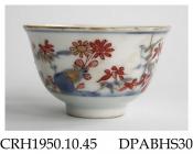 Tea bowl, hard paste porcelain, decorated in Chinese Imari style, blue painted underglaze rocks, bamboo, insects and a bird with further onglaze decoration in gilt and red enamel; not marked, Jingdezhen, Jiangxi Province, China, c.1700-1730
probably a p