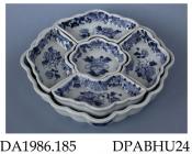 Sweetmeat dish, or pickle tray, hard paste porcelain, scalloped polygonal shape with five fitted dishes, decorated with a blue peony sprig and border incorporating diaper panels, insects, flowers and scrolls; not marked, made in Jingdezhen, Jiangxi Prov