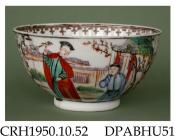 Slop bowl, hard paste porcelain, decorated in colours with two scenes of Chinese figures in a garden, one figure with a tame bird, the scenes separated by c-scroll panels enclosing miniature landscapes, dagger border inside rim; not marked, made in Jing