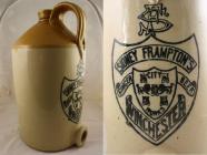 Brown and cream stoneware jug used for holding ginger beer, manufactured by J Price of Bristol and used by Sidney Frampton of Winchester