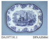 Meat dish, white earthenware, decorated with one of a group of flow blue printed designs showing a ruined lakeside castle within a border of oak leaves and acorns; back, impressed crown, printed factory mark in green and printed registered design mark i