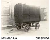 Photograph, black and white, showing a steel enclosed body on a trailer, built by Tasker and Co, Waterloo Foundry, Anna Valley, Abbotts Ann, Hampshire