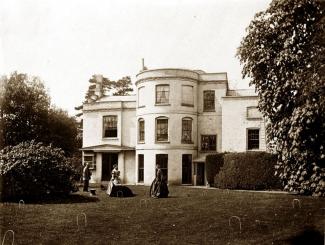 Original sepia print of Otterbourne House (Mr J B Yonge's house), the garden front showing the garden with croquet hoops, with figures, c. 1870