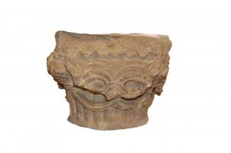 Carved capital decorated with stylised animal heads. From Hyde Church, Hyde Abbey, Winchester, Hampshire.
