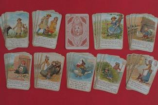 Card game, Snap, 36 cards, 9 sets of 4 colour printed cards featuring nursery rhymes and their characters, the backs of the cards are brown printed with a small dog within a circular design, early 20th century
the nursery rhymes are; Jack and Jill, Baa 
