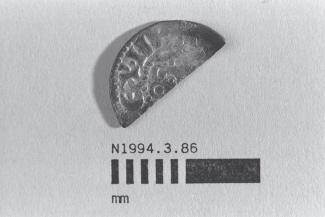Half a coin, halfpenny, part of a hoard found at White Lane, Greywell, Mapledurwell and Up Nately, Hampshire in 1989, issued by Henry III, minted at Canterbury, Kent, 1248-1250