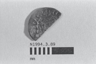 Half a coin, halfpenny, part of a hoard found at White Lane, Greywell, Mapledurwell and Up Nately, Hampshire in 1989, issued by Henry III, minted by the moneyer Henri at London, 1248-1250