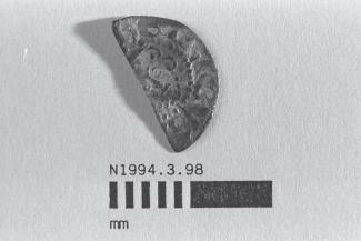 Half a coin, halfpenny, part of a hoard found at White Lane, Greywell, Mapledurwell and Up Nately, Hampshire in 1989, issued by Henry III, minted at Norwich, Norfolk, 1248-1250