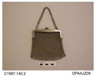 Bag, metal mesh, metal frame with snap closure, chain handle, unlined, lower edge trimmed metal balls, approximate width 145mm, approximate depth excluding ball trim 115mm, c1880-1900