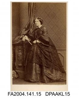 Photograph, Lady Dormer, seated with one arm resting on a bit of furniture, taken by Southwell Brothers of Londonvol 1, page 4 - The Family and Connections
