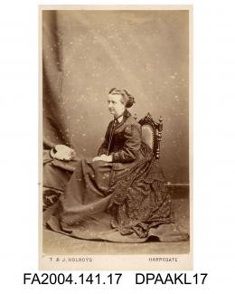 Photograph, Mrs Katherine Radcliffe seated by a table, taken by T and J Holroyd of Harrogatevol 1, page 4 - The Family and Connections