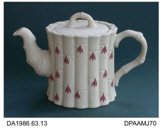Teapot, cane ware, shaped in the manner of certain late 18th century teapots in the form of cut lengths of bamboo decorated with red brown leaves, impressed on base WEDGWOOD and MADE IN ENGLAND, made by Josiah Wedgwood and Sons, Barlaston, Staffordshire