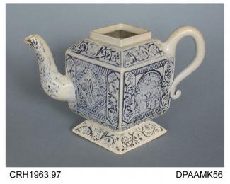 Teapot, lid missing, salt-glazed white stoneware, diamond shape on a pedestal base with scratch blue decoration showing a fleur-de-lys, a tea party, Bacchus and an heraldic lion, not marked, made in Staffordshire, c1740-1750