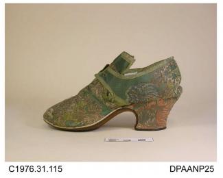 Shoes, pair, women's, bizarre style brocaded silk in complex floral design of silver, green, yellow, white, shades of pink and coral, blunt rounded toe, straight side seam covered pale green ribbon, square tongue with band of plain green silk, all edges