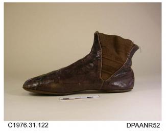 Boots, pair, girl's, ankle boots, brown leather, elasticated sides, lined white linen, cotton tape loop attached to top of front seam for boot hook, flat leather sole, rounded toe with ornamental toecap with decorative stitching and punching, approximat