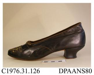 Shoes, pair, women's, court shoe, bronze kid, edges bound brown silk ribbon, lined throughout with nut brown satin, curved side seam, straight rear seam, almond pointed toe trimmed with design in gold and bronze beads, beaded bar trim to throat, knock-o