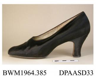 Shoes, pair, women's, evening, black satin, court shoe, oval toe, high fairly straight Louis heel, kidney shaped heel top piece, lined white kid, insole stamped Jack Jacobus Ltd, Shaftesbury Avenue, London, leather sole cross scored to improve grip on d