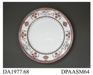 Dinner plate, white earthenware, black printed 'Berlin Bird' design overpainted in red enamel and straw-colour lustre; back, red painted pattern number, impressed factory marks including letter T, BB (for Best Body) and date symbol for 1870 and printed 