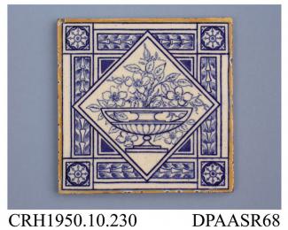 Tile, pressed clay dust, with a blue printed design showing a shallow urn of wild roses in a rotated square frame, the tile edges enamelled yellow; back, moulded grid pattern incorporating factory mark and printed registered design mark with encoded dat