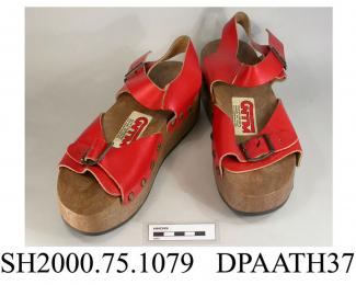 Shoes, pair, women's, Pop Wheels Roller Skates, red leather strap over forefoot with buckle closure, red leather ankle strap with buckle closure, brown synthetic platform sole with retractable red roller skates, label CNTM Diffusion, Made in Italy, blac