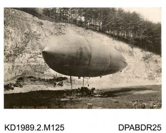 Photograph, black and white, showing a military airship Beta, in the chalk pit at Bury Hill, Upper Clatford, Hampshire, 1910