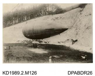 Photograph, black and white, showing a military airship Beta, in the chalk pit at Bury Hill, Upper Clatford, Hampshire, 1910