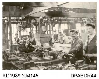 Photograph,black and white, showing men in the old fitting shop, Tasker and Co, Waterloo Foundry, Anna Valley, Abbotts Ann, Hampshire