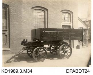 Photograph, black and white, showing a 4 wheel trailer, for Dundee District Committee, Dundee, Andus, Scotland, built by Tasker and Co, Waterloo Foundry, Anna Valley, Abbotts Ann, Hampshire