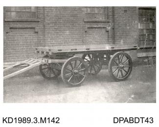 Photograph, black and white, showing a horse drawn trailer, built by Tasker and Co, Waterloo Foundry, Anna Valley, Abbotts Ann, Hampshire