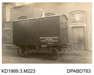 Photograph, sepia, showing a trailer, for Northamptonshire County Council, built by Tasker, Waterloo Iron Works, Anna Valley, Abbotts Ann, Hampshire