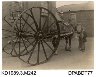 Photograph, black and white, showing a cable drum carrier, built by Tasker and Co, Waterloo Foundry, Anna Valley, Abbotts Ann, Hampshire, 1920 - 1925