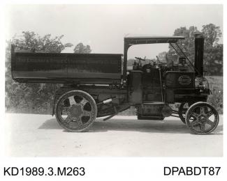Photograph, black and white, shoing a tipper trailer and engine, for for Enderbury and Stoney Stouton Granite Co, Narborough, Leicester, built by Tasker and Co, Waterloo Foundry, Anna Valley, Abbotts Ann, Hampshire, 1919